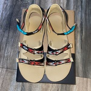 Teva Beige Tan Sandals with Black and Red Patterned Straps